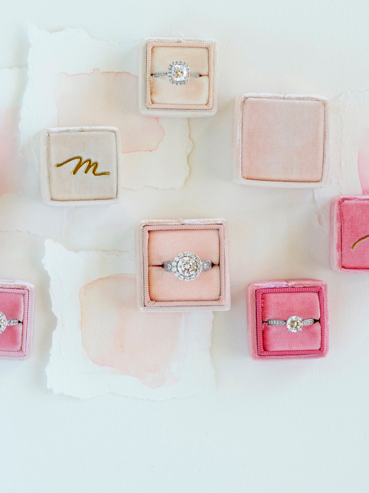 pink ring boxes with monograms for engagement gift