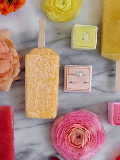 pink and yellow popsicle styling with ring boxes